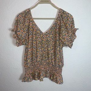 light pink floral blouse